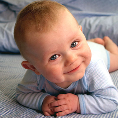 smiling baby boy at a Preschool & Daycare Serving Carmel, Indiana