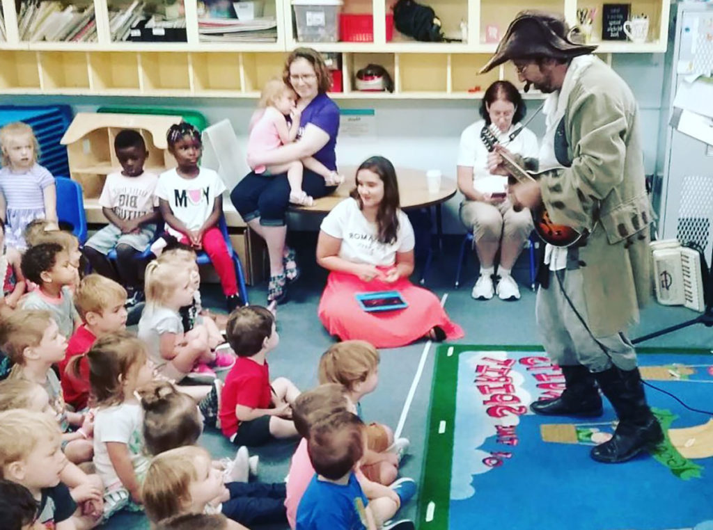 children listening to music at a Preschool & Daycare Serving Carmel, Indiana