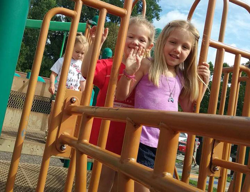 Kindergarten children on playground at a Preschool & Daycare Serving Carmel, Indiana