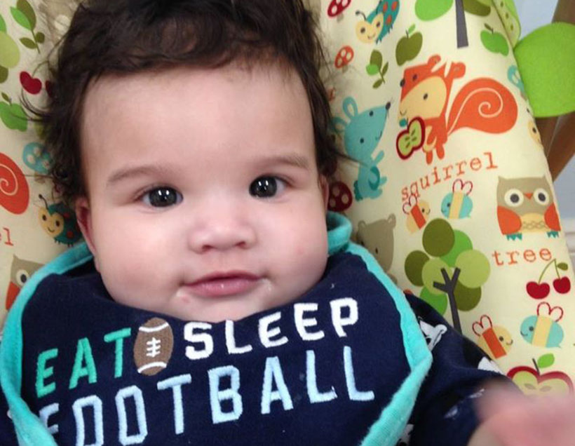 cute baby smiling at a Preschool & Daycare Serving Carmel, Indiana