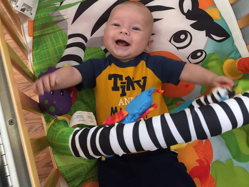 happy laughing baby at a Preschool & Daycare Serving Carmel, Indiana