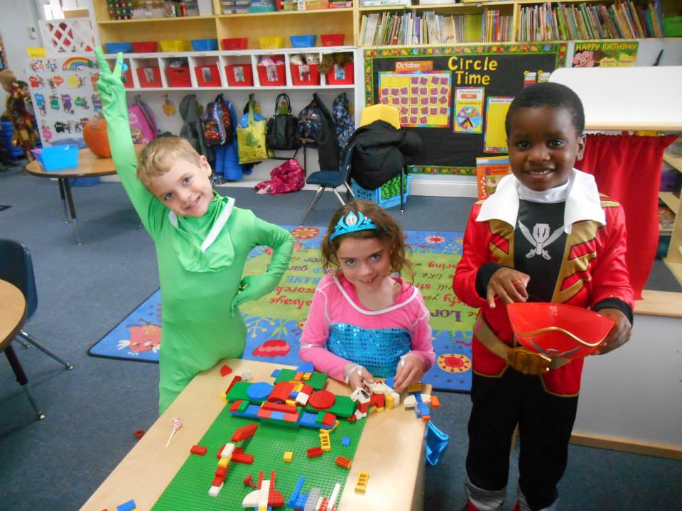 smiling pre k children in costume at a Preschool & Daycare Serving Carmel, Indiana