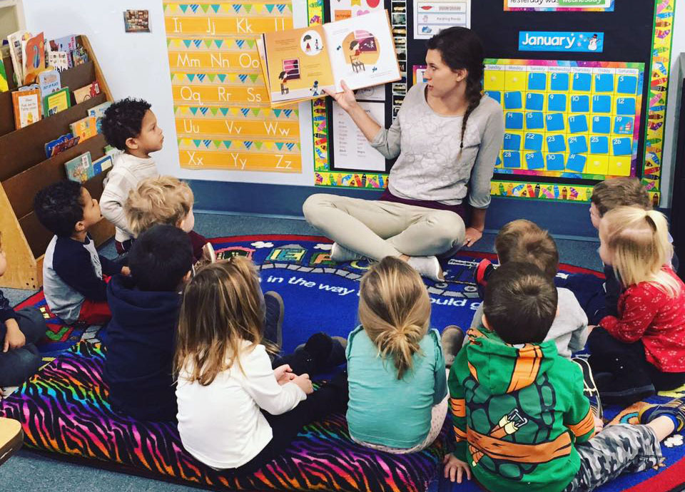 teacher reading to children at a Preschool & Daycare Serving Carmel, Indiana