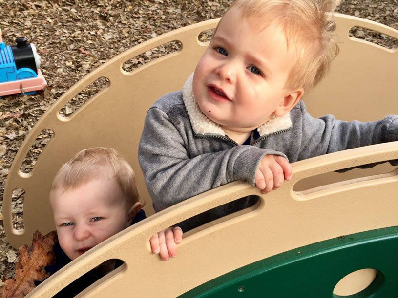 toddlers climbing bridge outdoor at a Preschool & Daycare Serving Carmel, Indiana