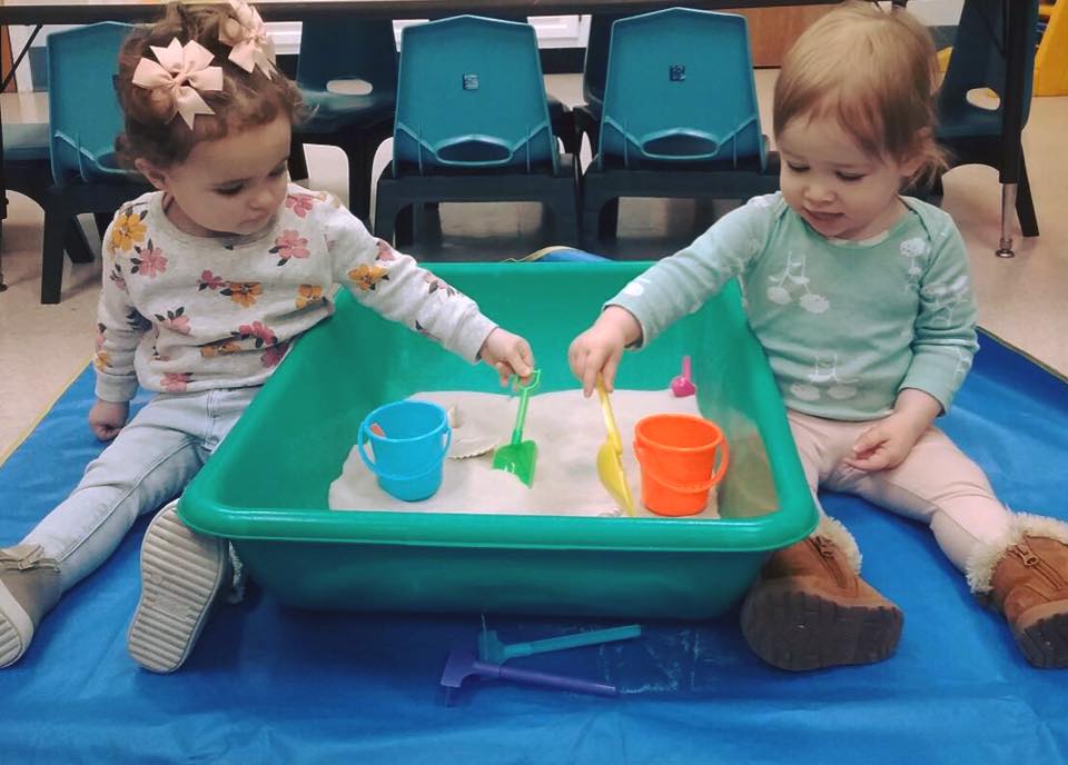 toddlers playing with sandbox at a Preschool & Daycare Serving Carmel, Indiana