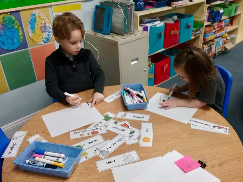 young boy learning to read at a Preschool & Daycare Serving Carmel, Indiana